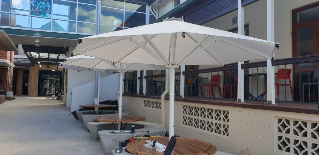 Setting up commercial umbrellas out the front or back of your business premises is a simple, effective way to make the most of your outdoor space