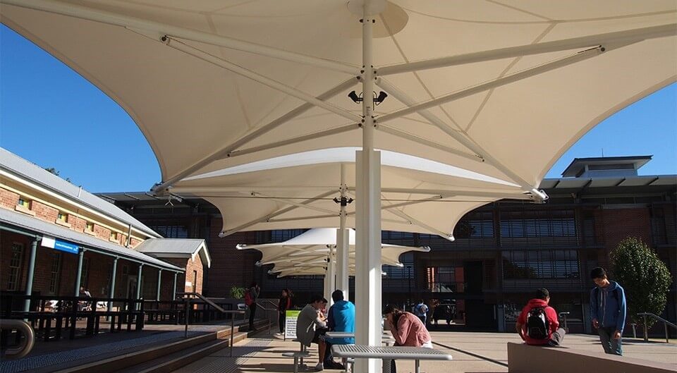 The Pavilion commercial grade umbrella is ideal for walkways as multiple units can be linked together 