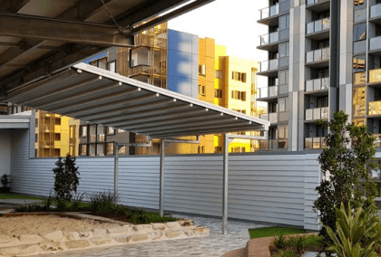 Retractable PVC roofing system for Guardian Early Learning Centre in Brisbane designed, manufactured, and installed by Versatile Structures.