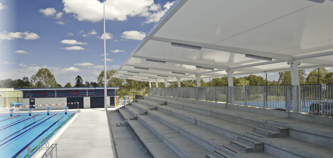 Waterproof shade structure manufactured, and installed by Versatile Structures
