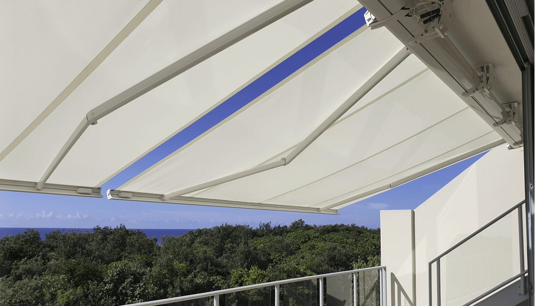 Retractable shade sail designed, manufactured, and installed by Versatile Structures