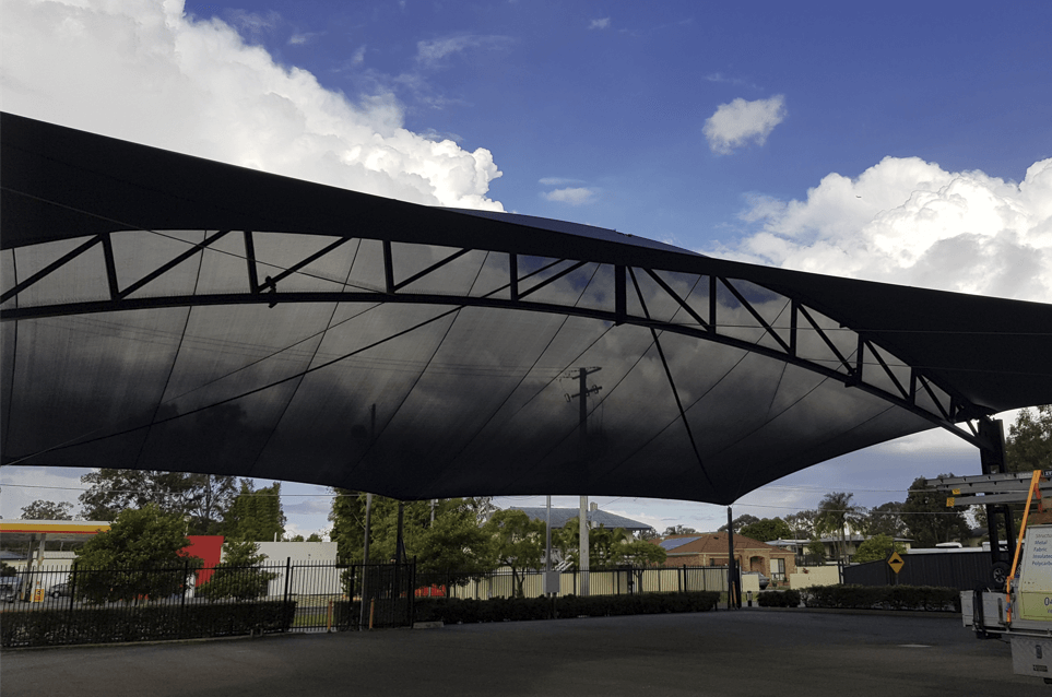 Fixed shade sail designed, manufactured, and installed by Versatile Structures