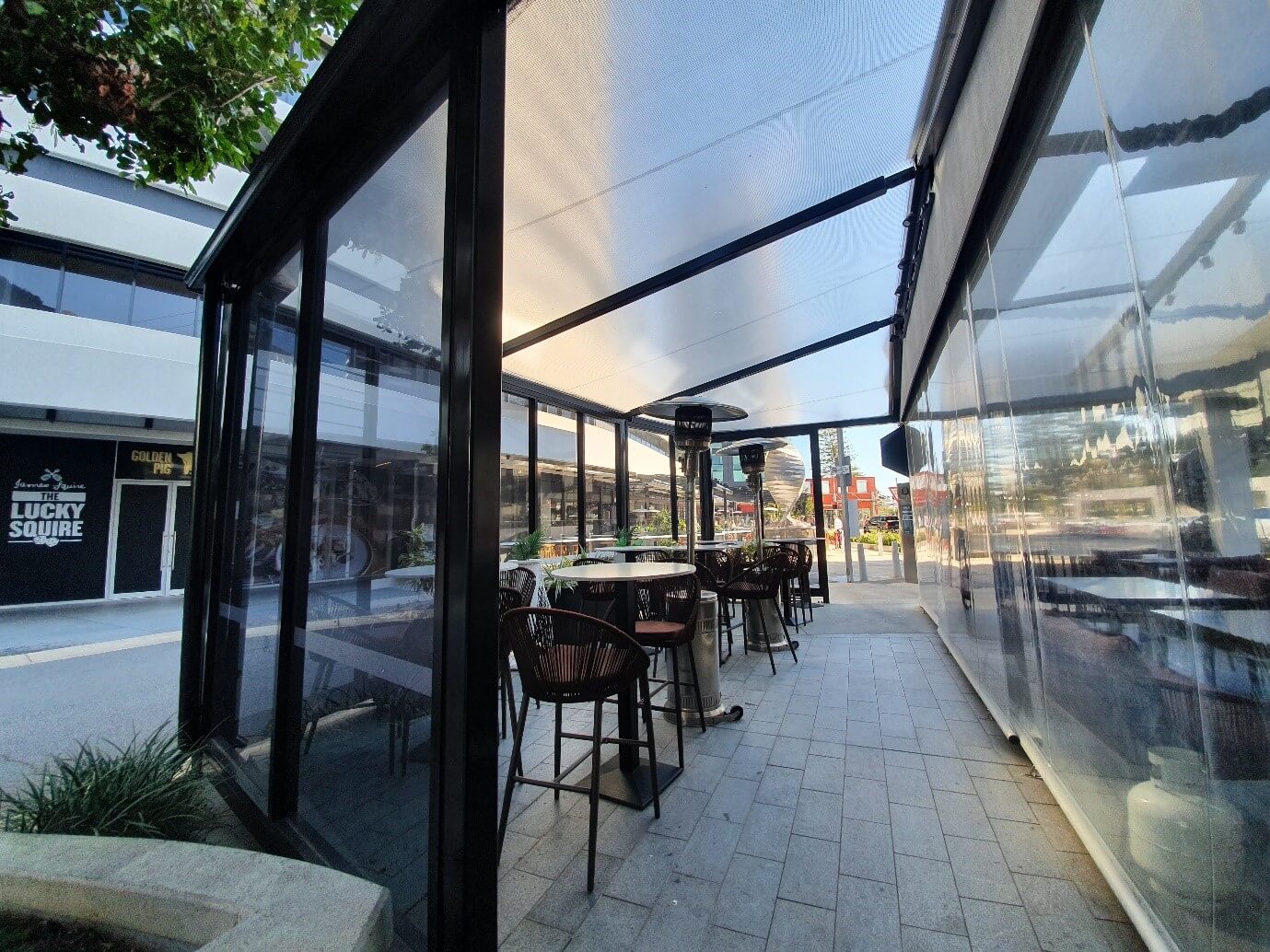 Restaurant waterproof structure designed, manufactured, and installed by Versatile Structures