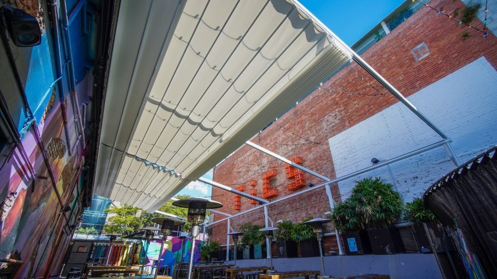 The Royal George Hotel waterproof shade structure installed by Versatile Structures