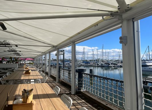 Commercial umbrella shade structure at the Kawana Waters Hotel installed by Versatile Structures